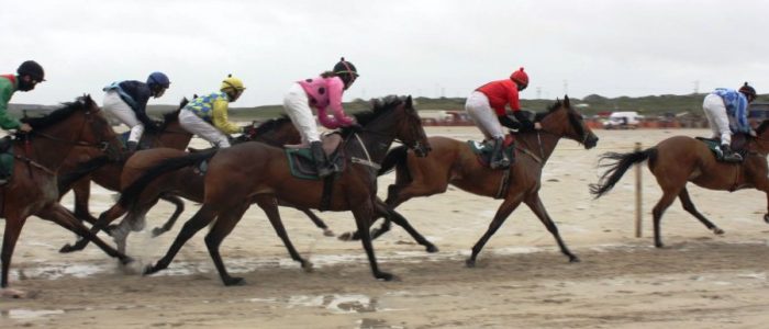 Horse Racing On The Beach